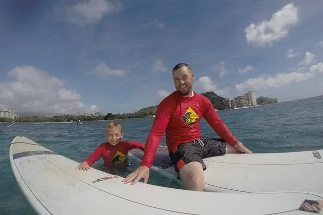 Waikiki Family Surfing Lesson with Shuttle - Image 1