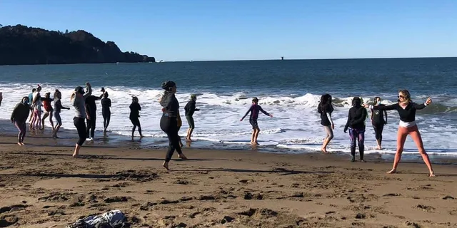 San Francisco Silent Disco Yoga at Baker Beach - Image 5