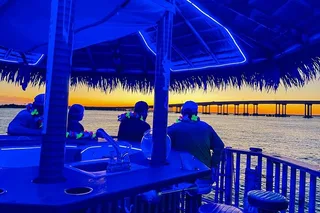 Destin Tiki Boat Tour at Sunset 1.5 hr